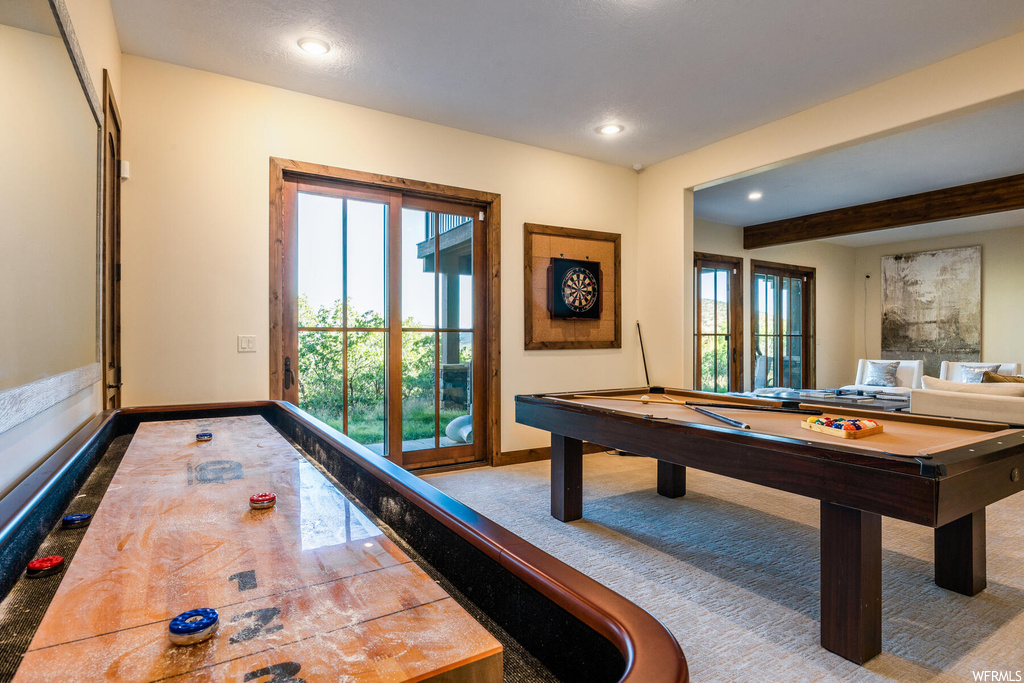 Playroom with plenty of natural light, billiards, and beamed ceiling
