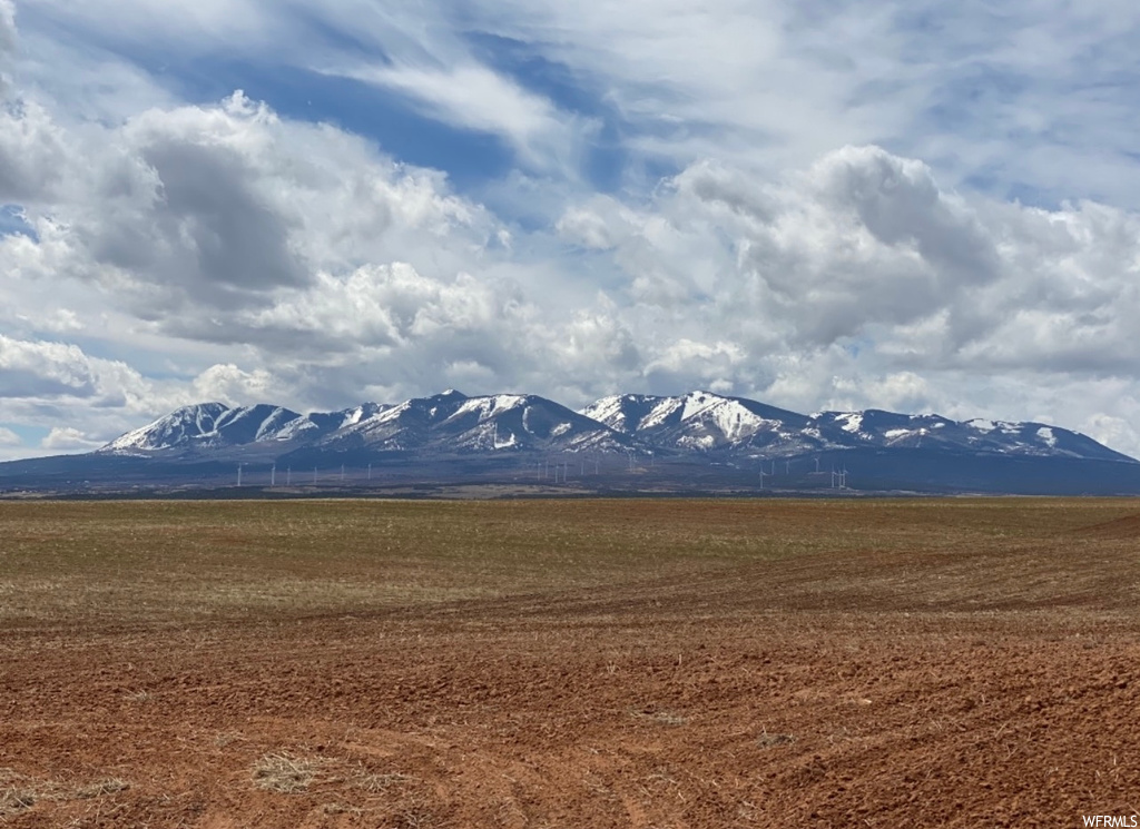 Property view of mountains featuring a rural view