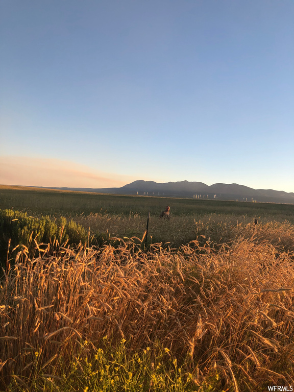 View of mountain feature with a rural view