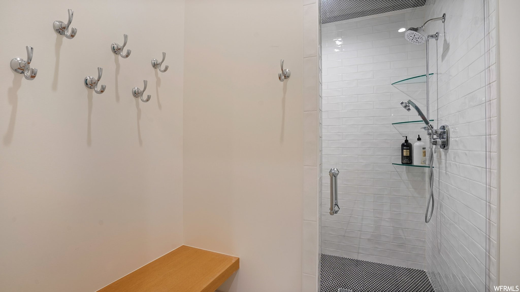Bathroom with tiled shower