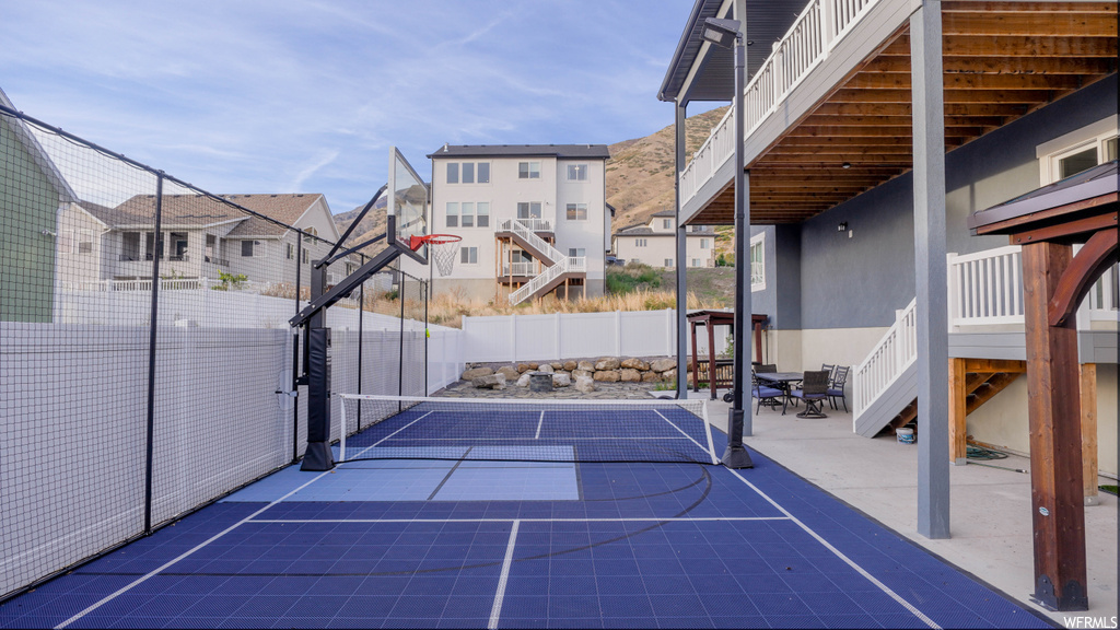View of sport court with basketball hoop