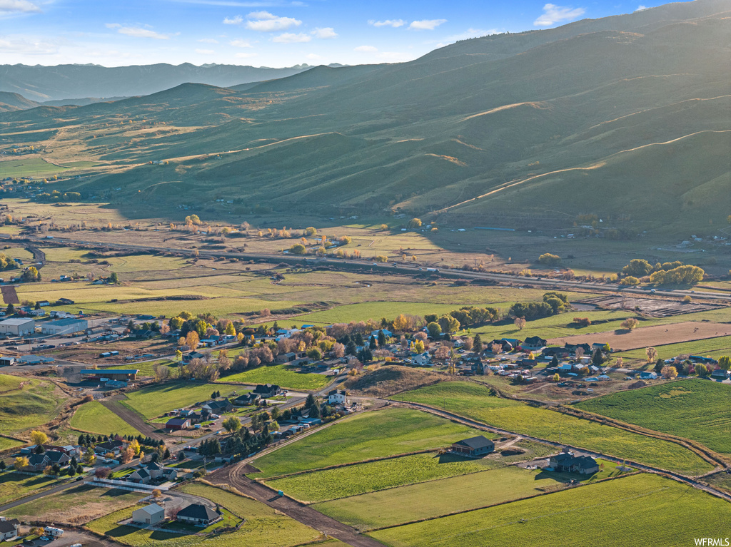 Aerial view with a mountain view and a rural view