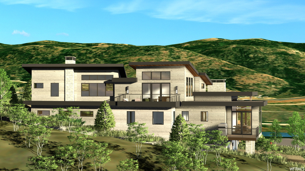 Exterior space with a balcony and a mountain view