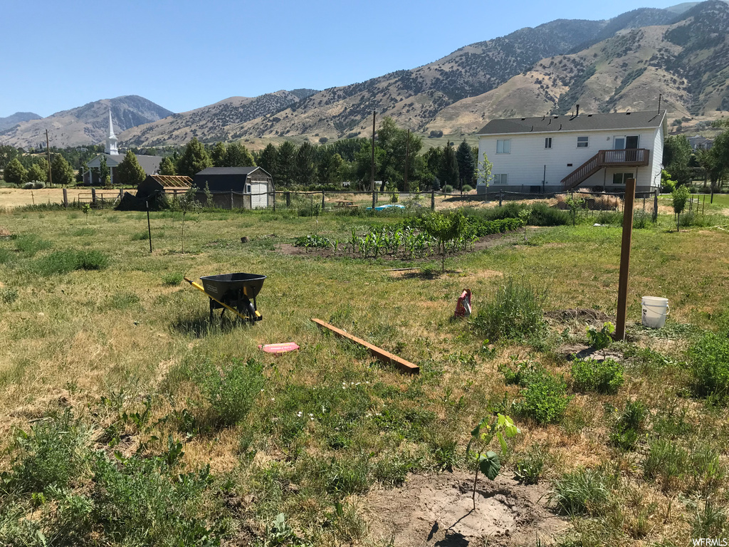 Property view of mountains featuring a rural view