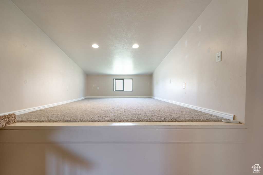 Bonus room with carpet, baseboards, and recessed lighting