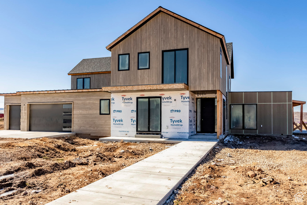 View of front facade with a garage