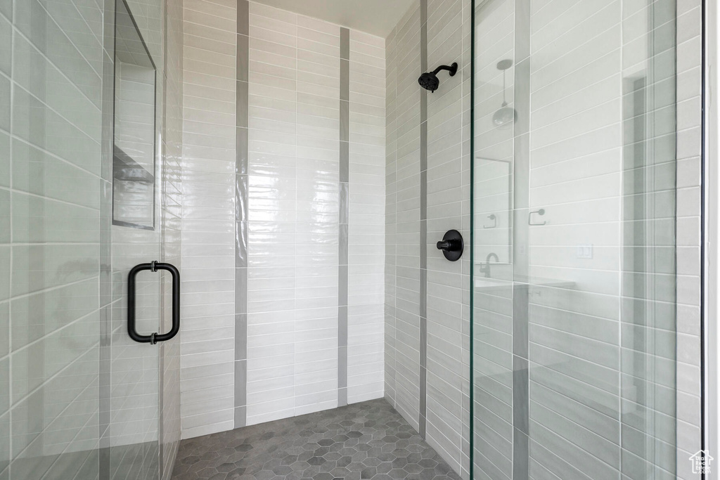 Bathroom with a shower with door