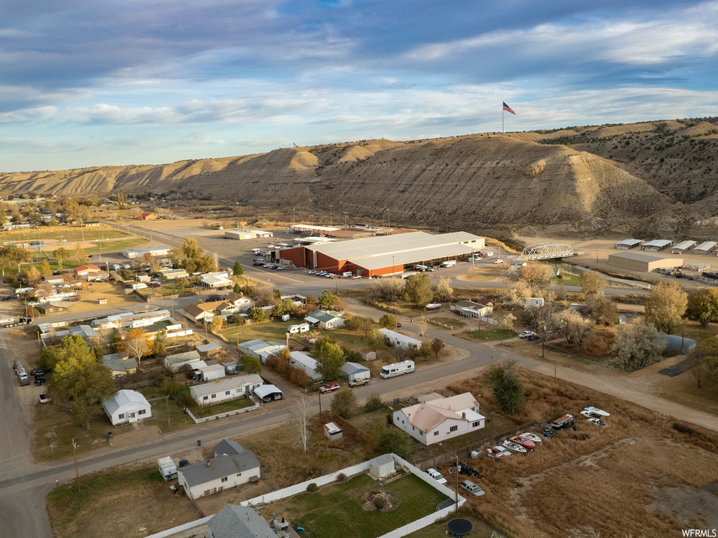 Birds eye view of property with a mountain view