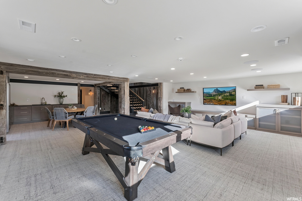 Rec room featuring pool table and light colored carpet
