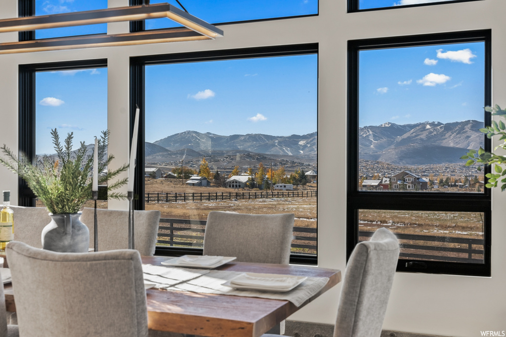 Dining room featuring a mountain view