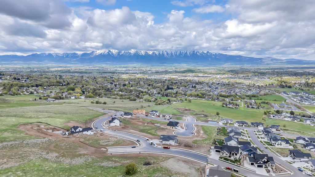 Birds eye view of property featuring a residential view and a mountain view