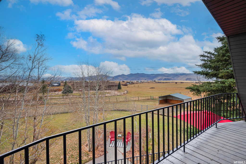 Balcony with a rural view and a mountain view