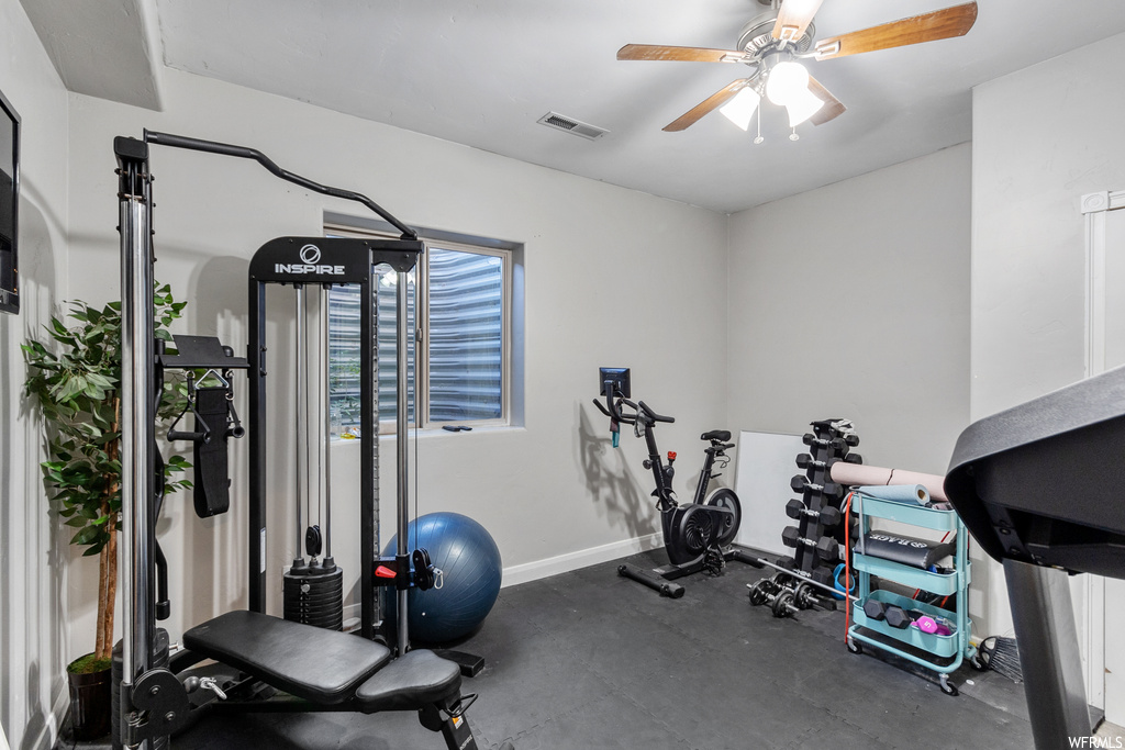 Exercise area featuring ceiling fan