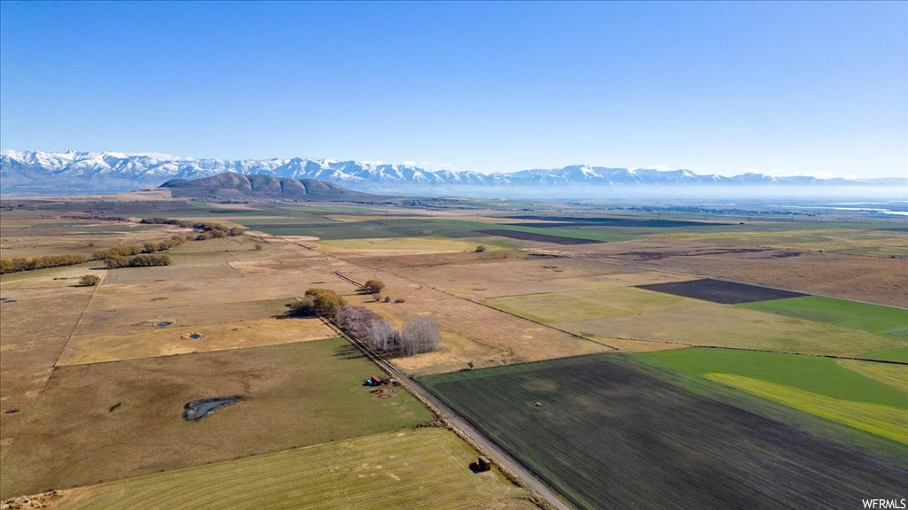 Drone / aerial view with a rural view and a mountain view