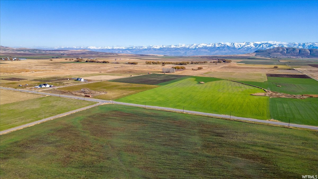 Birds eye view of property featuring a rural view and a mountain view