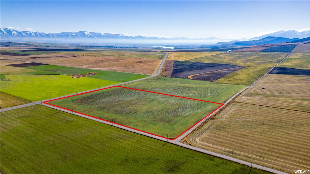 Drone / aerial view featuring a mountain view and a rural view