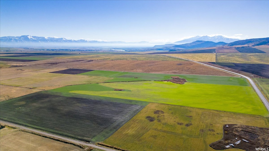 Drone / aerial view featuring a rural view and a mountain view