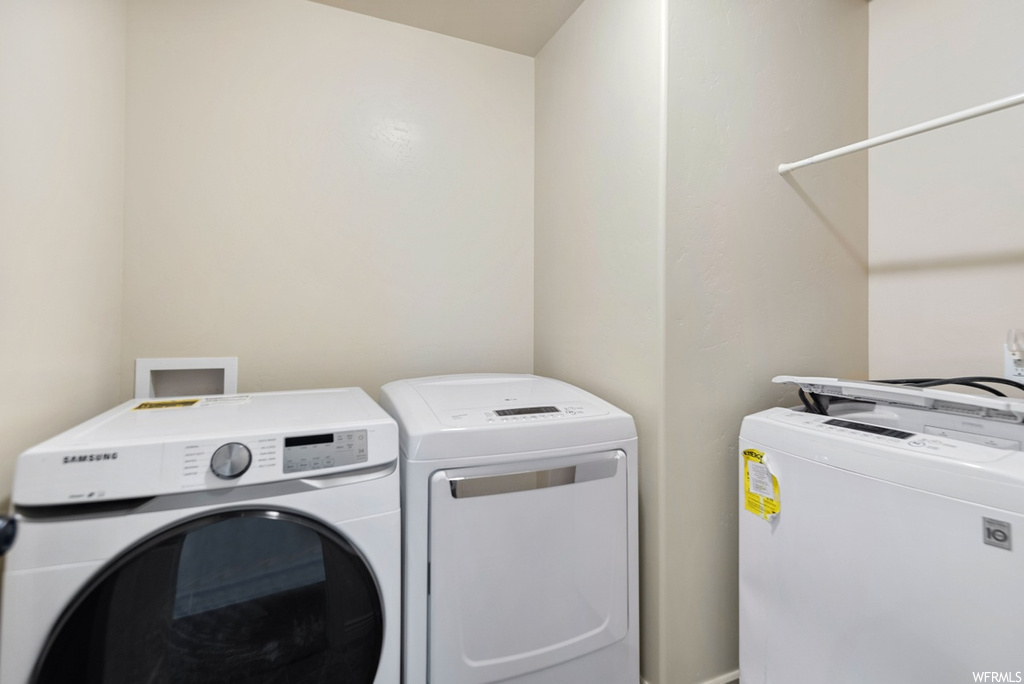 Washroom featuring separate washer and dryer and washer hookup
