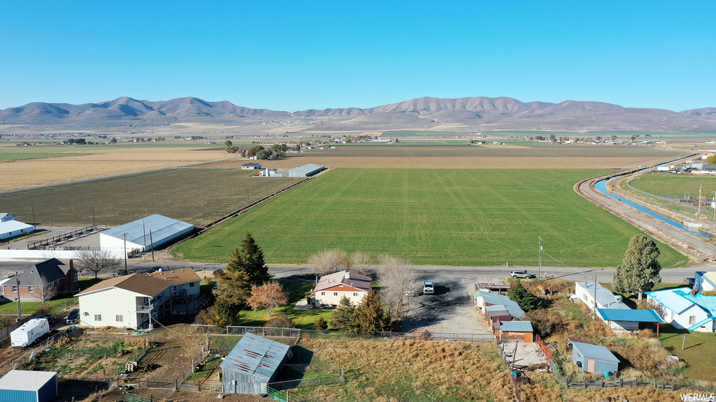 Birds eye view of property featuring a rural view and a mountain view
