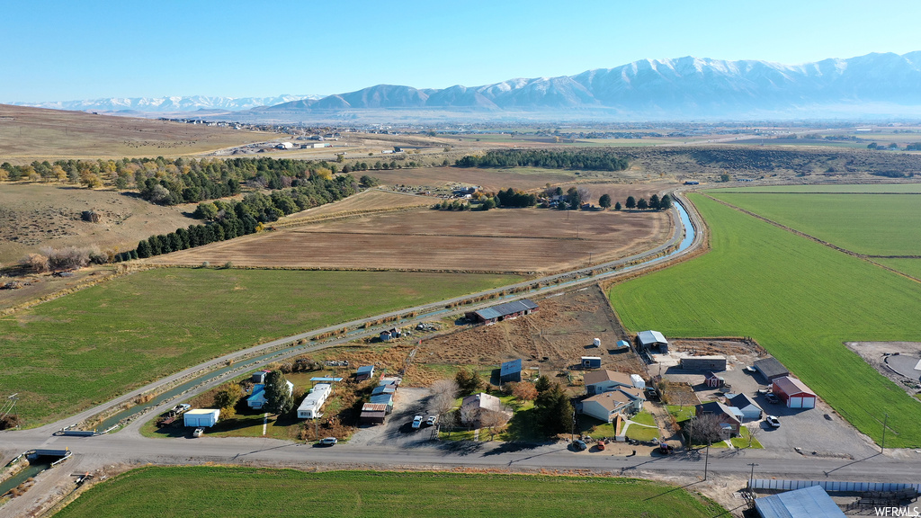 Aerial view featuring a rural view and a mountain view