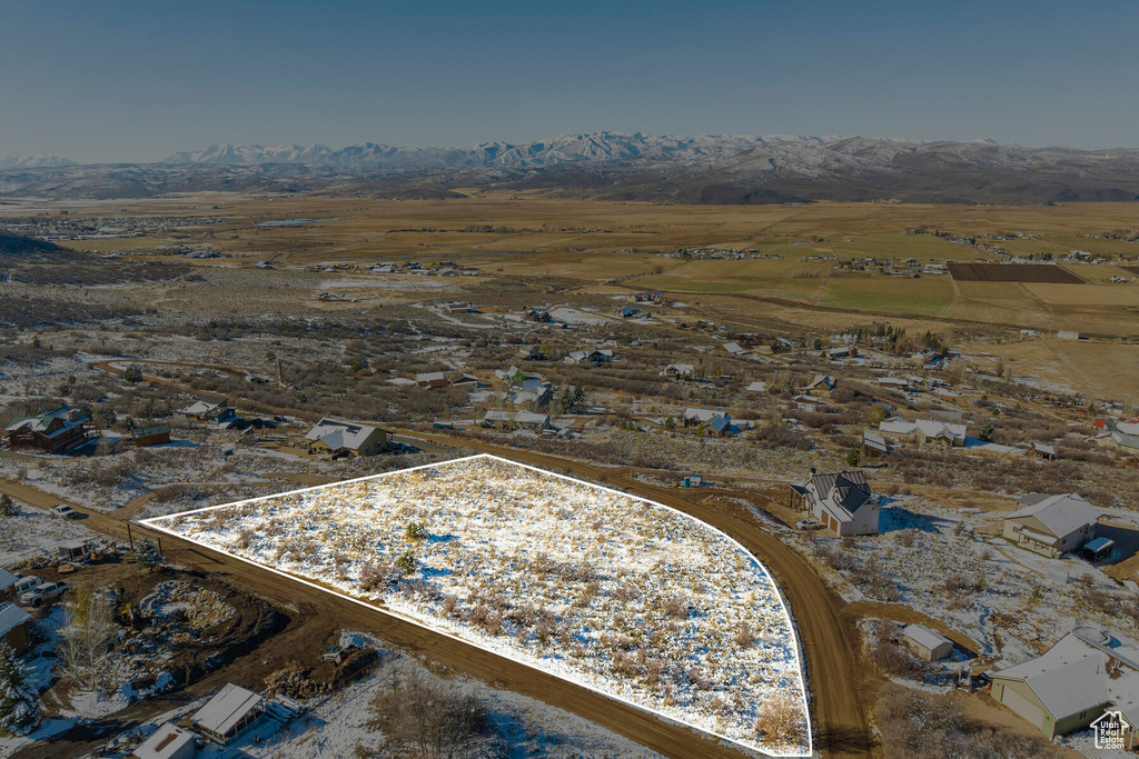 Drone / aerial view featuring a mountain view