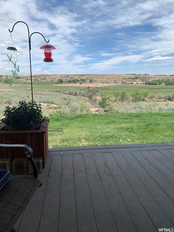 Wooden terrace with a rural view