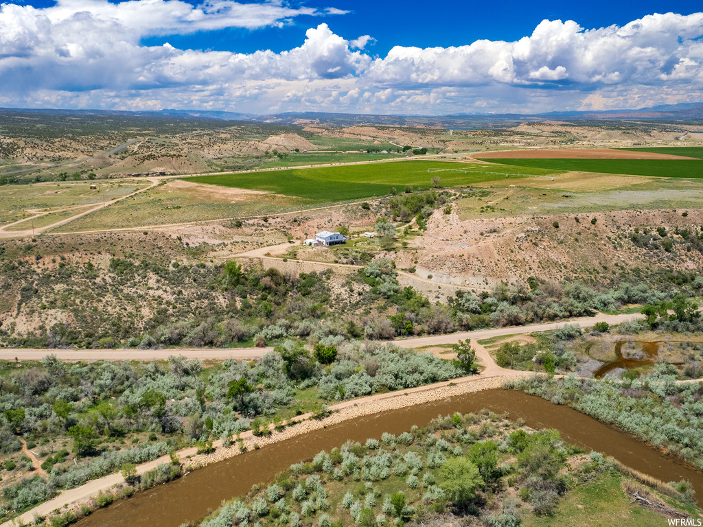 Bird's eye view featuring a water view and a rural view