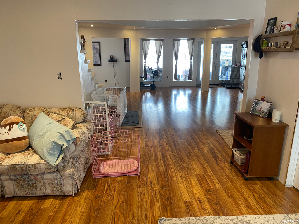 Living room featuring dark hardwood / wood-style flooring