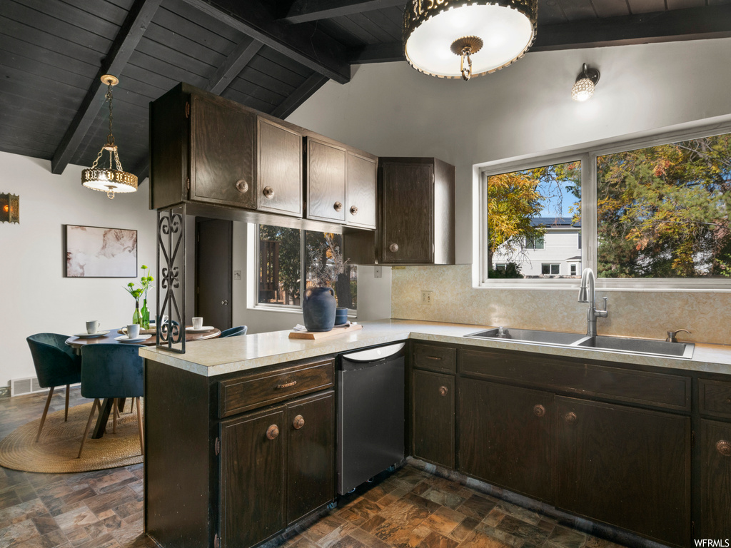 Kitchen featuring sink, wooden ceiling, stainless steel dishwasher, kitchen peninsula, and dark brown cabinetry