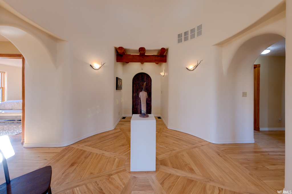 Interior space featuring light parquet flooring