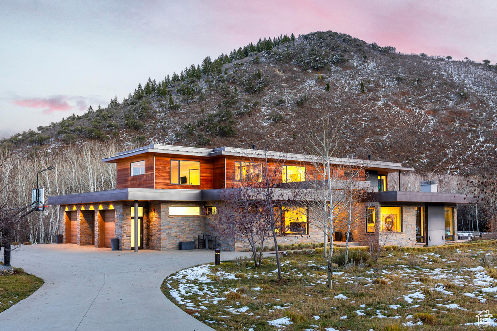 Contemporary home featuring a mountain view