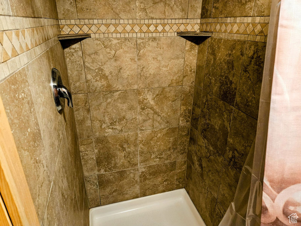 Bathroom with a tile shower