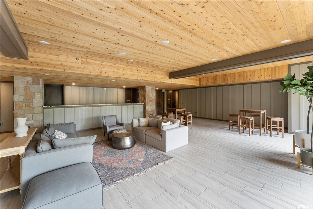 Living room featuring wood ceiling