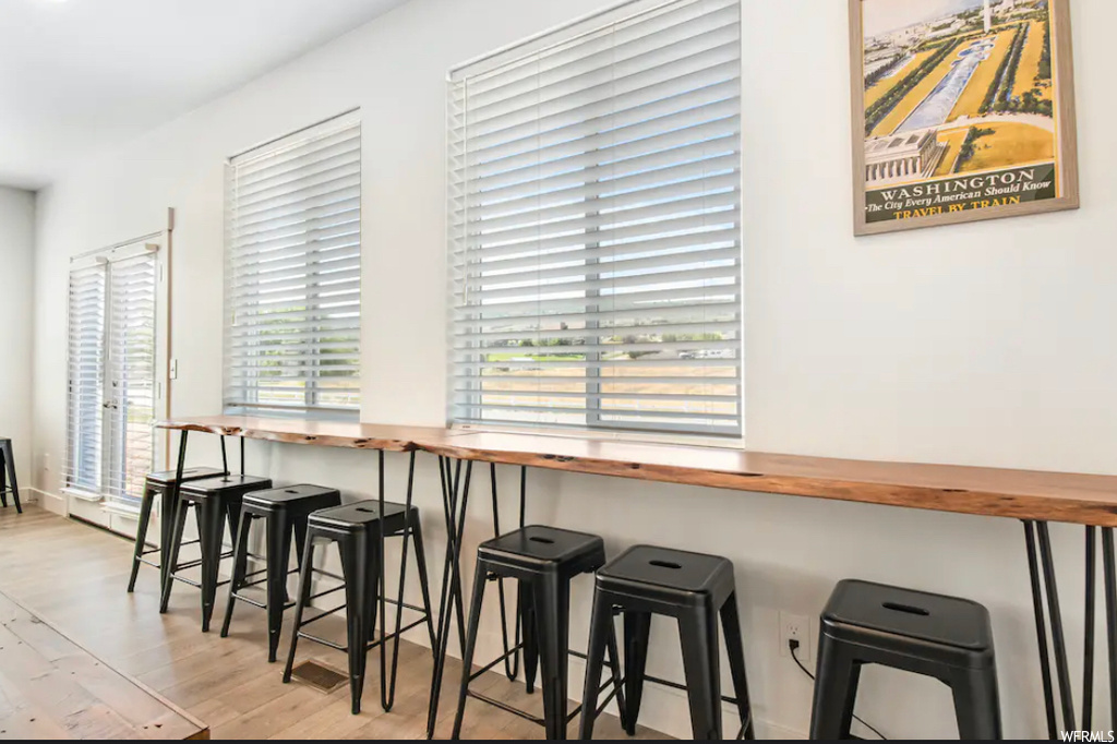 Dining room featuring plenty of natural light and light hardwood / wood-style flooring