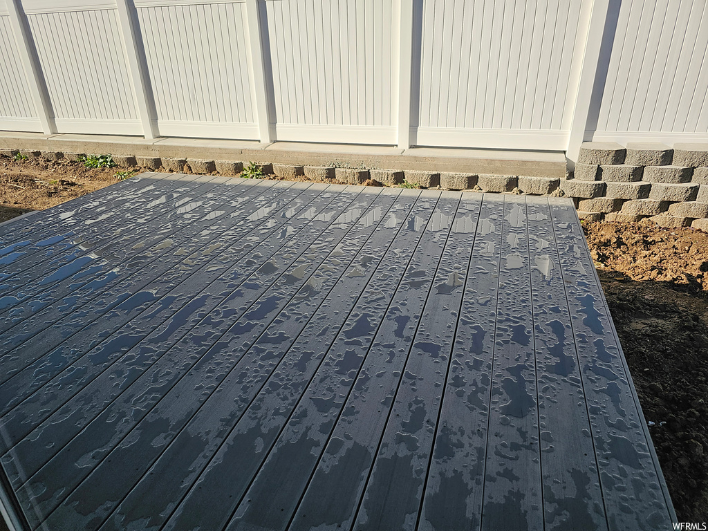Exterior details featuring wood-type flooring