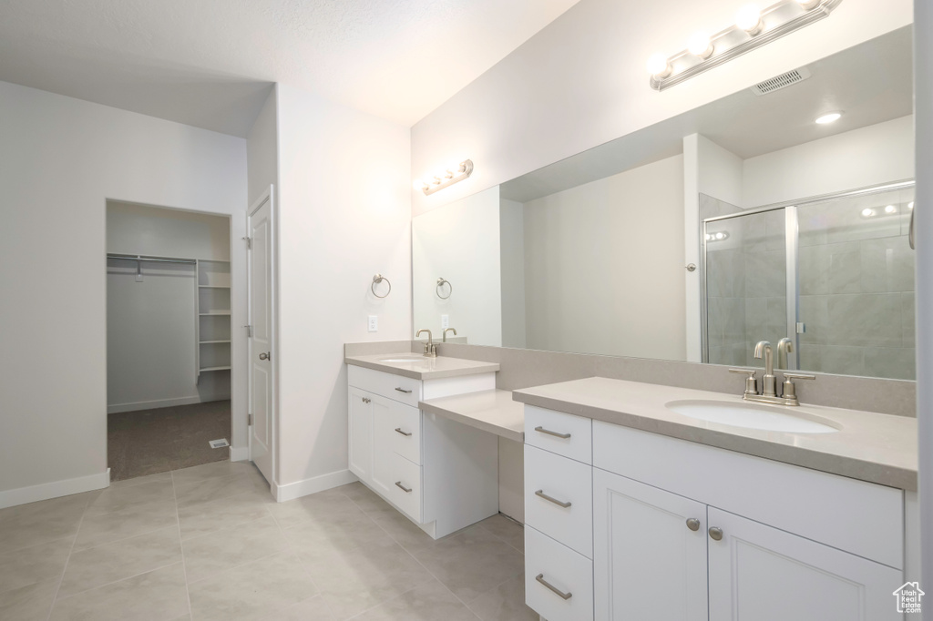 Bathroom with tile floors and vanity