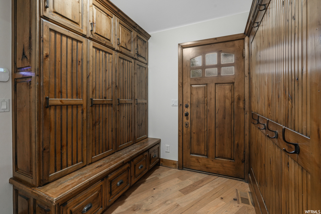 Mudroom featuring light hardwood / wood-style floors