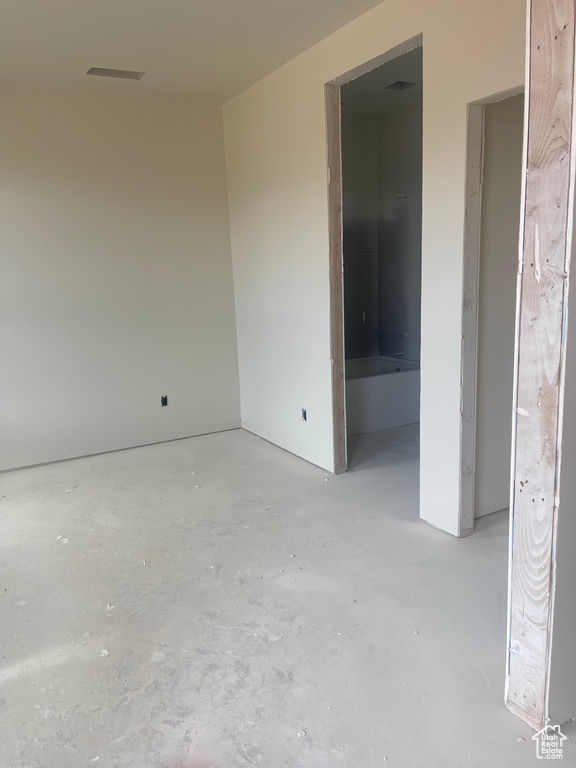 Spare room with concrete flooring