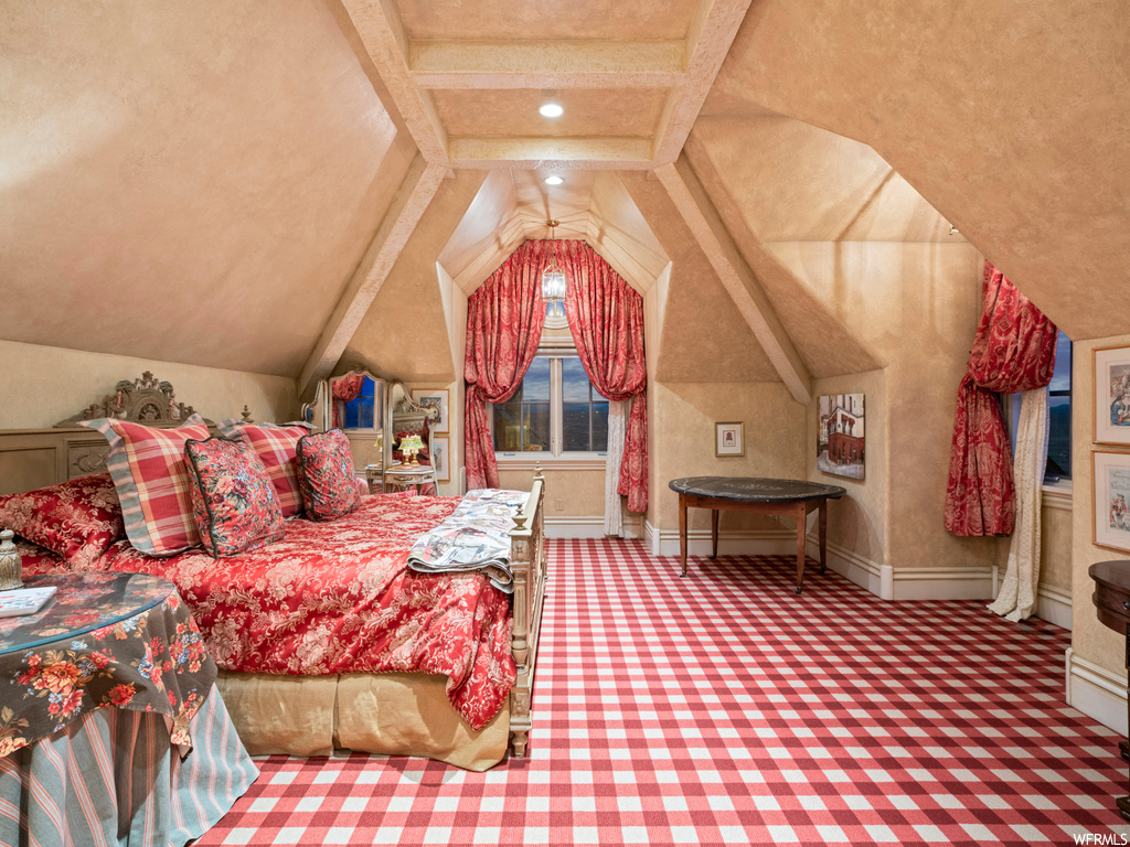 Bedroom with vaulted ceiling