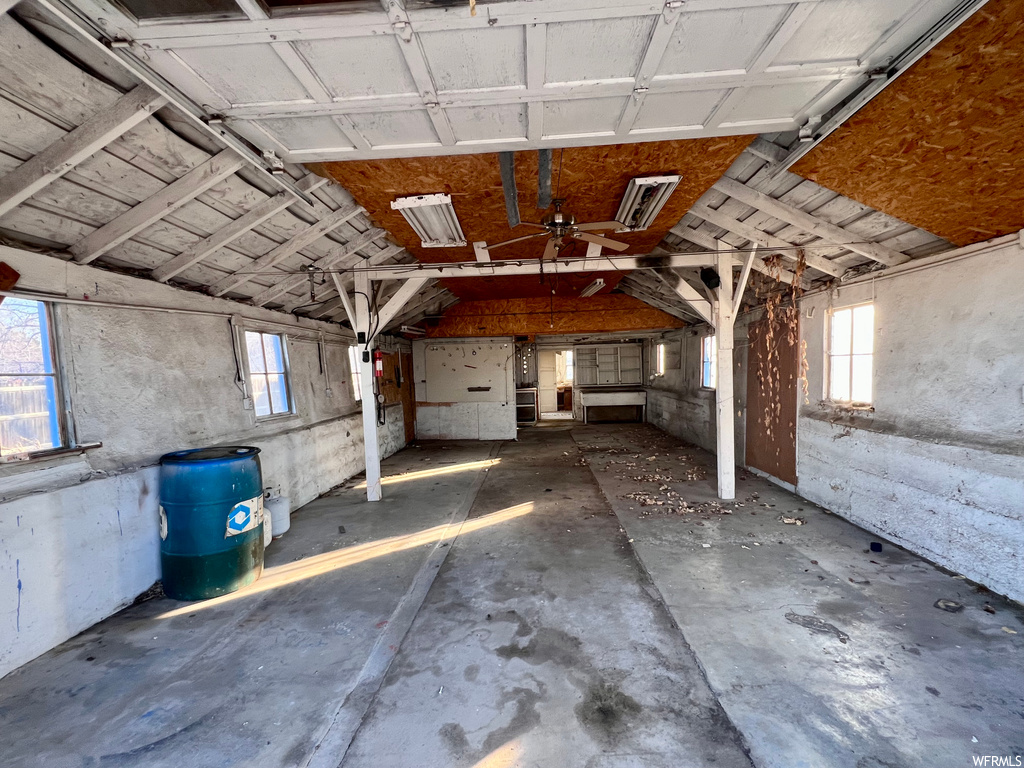 Garage featuring ceiling fan