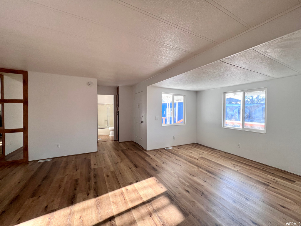 Spare room featuring light hardwood / wood-style floors