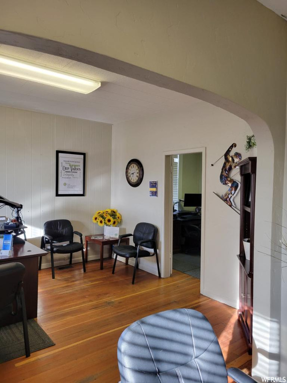 Living room with light hardwood / wood-style flooring