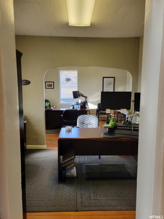 Office area featuring hardwood / wood-style floors