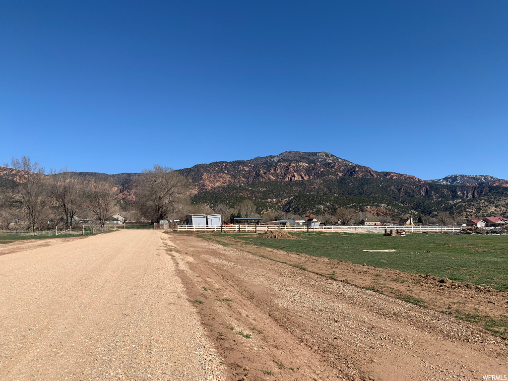 View of street with a mountain view and a rural view