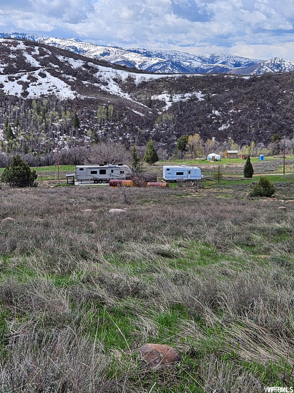 View of mountain feature with a rural view