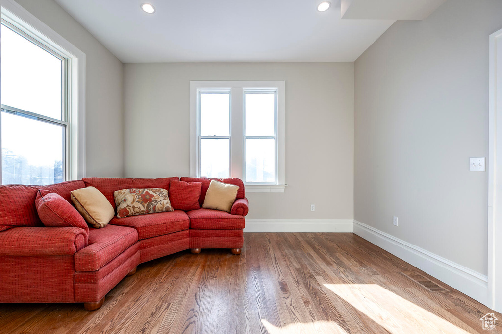 Living room with hardwood / wood-style floors