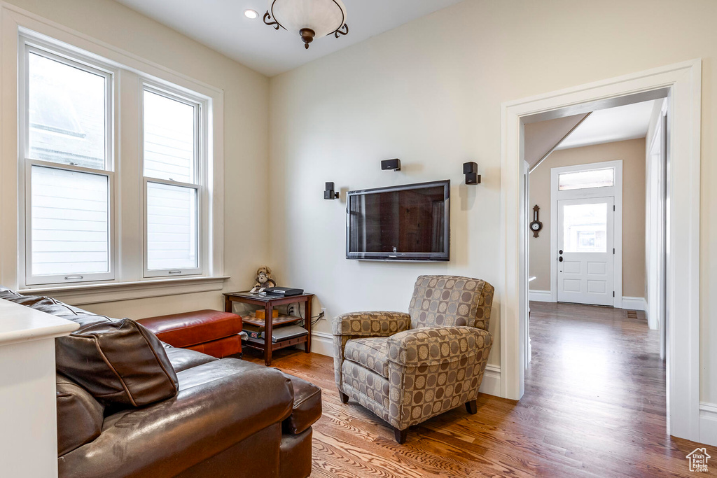 Living room with hardwood / wood-style floors