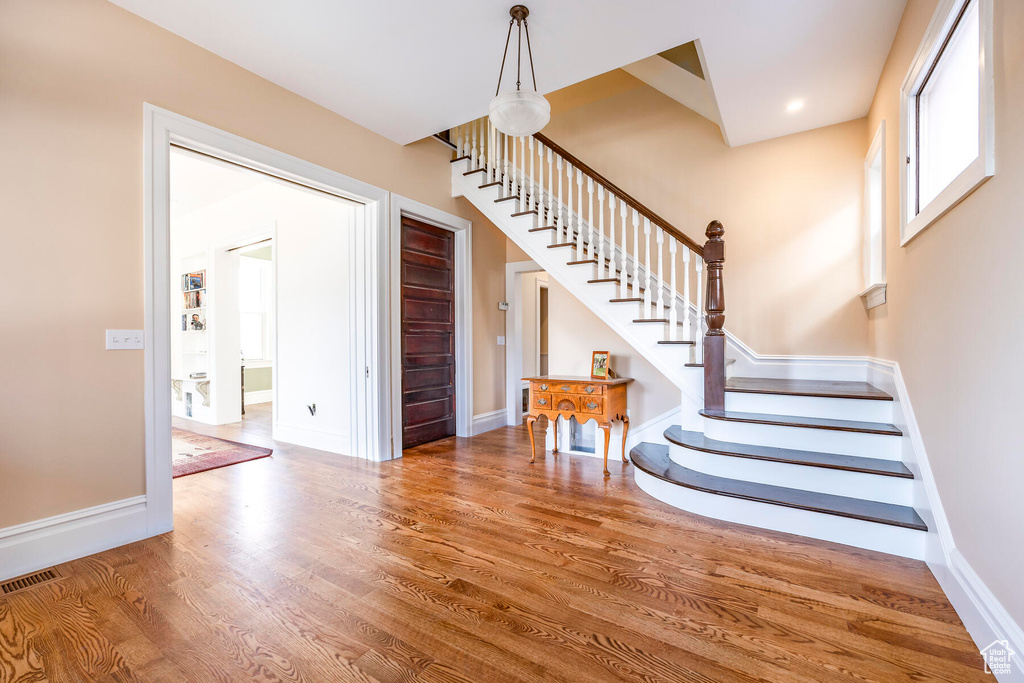 Foyer featuring wood-type flooring