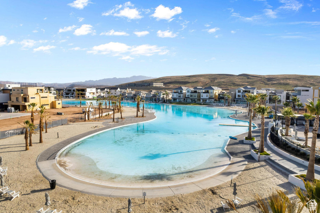 View of swimming pool featuring a mountain view