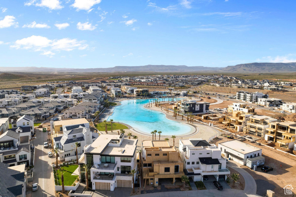 Birds eye view of property with a mountain view